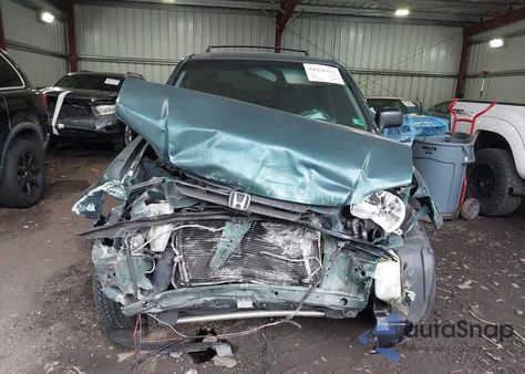 1999 Honda Cr-V Lx z USA, uszkodzony, nr VIN JHLRD2845XC004135